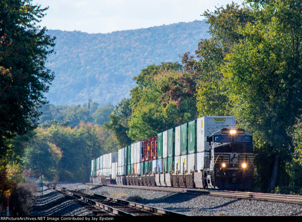 Another eastbound intermodal comes around the bend at Cove